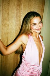 Madelyn Cline walks hallway noir in blush gown – July 2025 shoot