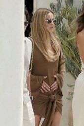 Margot Robbie's Ibiza Ease: Dinner in The Attico's Brown Mini Abito