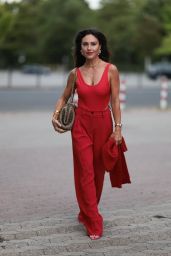 Nazan Eckes Ignites Riani Cruise with Fiery Red