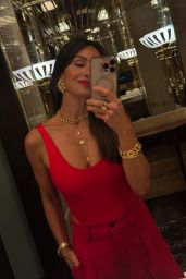 Nazan Eckes Ignites Riani Cruise with Fiery Red
