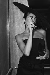 Paige DeSorbo Channels Noir Riviera in Sculptural Slit Dress – July 2025