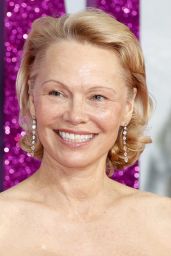 Pamela Anderson Attends Naked Gun Premiere in Regal Rodarte – London, 2025