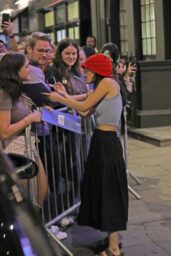Rachel Zegler's Ruby Beret & Coy Charm in NYC