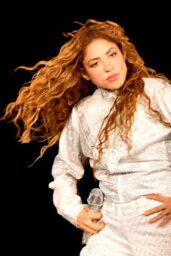 Shakira Dazzles in Shimmering White