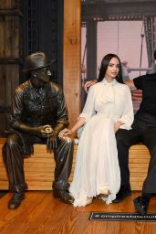 Sofia Carson Ascends Empire State in Ethereal Pleats
