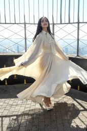 Sofia Carson Ascends Empire State in Ethereal Pleats