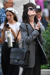 Anne Hathaway Commands Pinstripe Chic on Prada 2 Set
