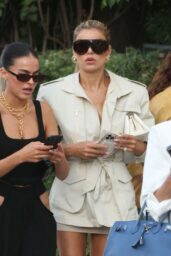 Brooks Nader seen with her sister Sarah Jane in a leggy golden look leaving Sunset Towers