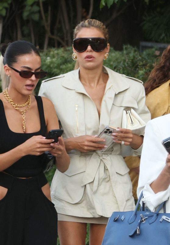 Brooks Nader seen with her sister Sarah Jane in a leggy golden look leaving Sunset Towers