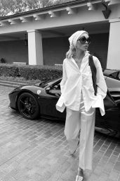 Elsa Hosk 2025 Style: White Shirt, Satin Pants, Prada Sunglasses, Suede Bag