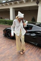 Elsa Hosk 2025 Style: White Shirt, Satin Pants, Prada Sunglasses, Suede Bag