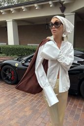 Elsa Hosk 2025 Style: White Shirt, Satin Pants, Prada Sunglasses, Suede Bag