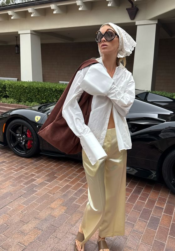 Elsa Hosk 2025 Style: White Shirt, Satin Pants, Prada Sunglasses, Suede Bag