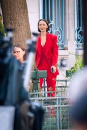 Lily Collins Debuts Fiery Parisian Power Suit on Emily in Paris Set