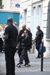 Lily Collins Debuts Fiery Parisian Power Suit on Emily in Paris Set