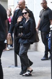 Lily Collins Debuts Fiery Parisian Power Suit on Emily in Paris Set