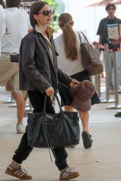 Lily Collins Debuts Neo-Gothic Airport Style in Venice