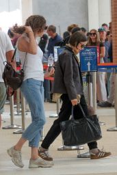 Lily Collins Debuts Neo-Gothic Airport Style in Venice