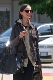 Lily Collins Debuts Neo-Gothic Airport Style in Venice