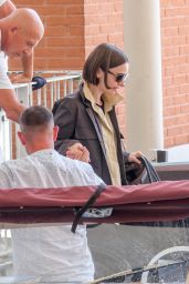 Lily Collins Debuts Neo-Gothic Airport Style in Venice