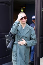 Miley Cyrus Exits Paris Hotel, Debuts Avant-Garde Trench