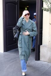 Miley Cyrus Exits Paris Hotel, Debuts Avant-Garde Trench