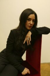 Monica Bellucci Unveils Noir Elegance at Milan Fashion Week 2003