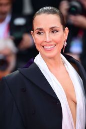 Noomi Rapace attends "Bugonia" Venice red carpet