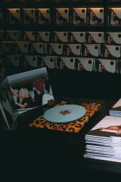 Sabrina Carpenter - Unveils Playful Vinyl Moment at Supervinyl