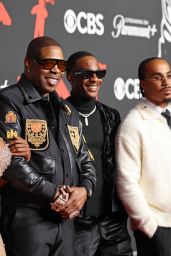Cacie Smith and Busta Rhymes attend 2025 MTV VMAs in crest-clad contrast