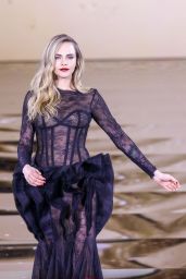 Cara Delevingne Champions Sheer Lace Gown on Paris Catwalk 2025