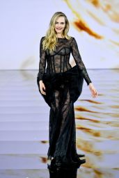 Cara Delevingne Champions Sheer Lace Gown on Paris Catwalk 2025