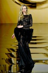 Cara Delevingne Champions Sheer Lace Gown on Paris Catwalk 2025