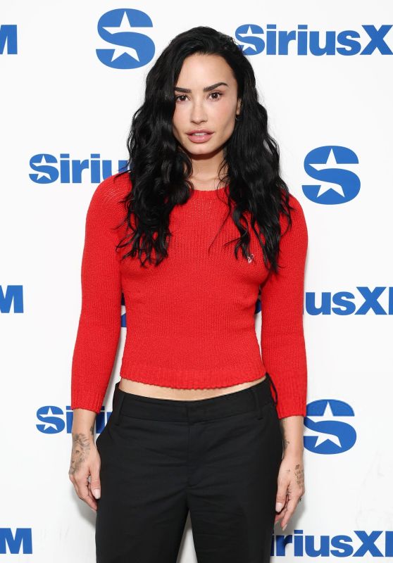 Demi Lovato Champions SiriusXM Visit in Crimson Ease