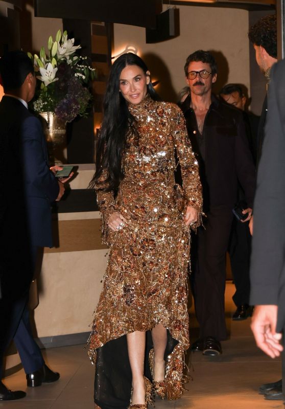 Demi Moore Commands Gucci After-Party in Gilded Motion