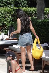 Dua Lipa Commands Miami Beach With Neon Yellow And Cut Off Denim Resort Style