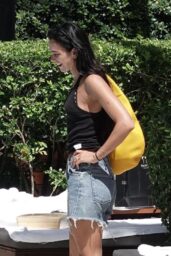 Dua Lipa Commands Miami Beach With Neon Yellow And Cut Off Denim Resort Style