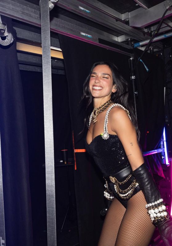 Dua Lipa Embodies Disco Glamour Backstage With Layered Pearl Chains