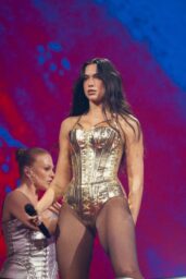 Dua Lipa Ignites Radical Optimism Tour in Gold Winged Spectacle