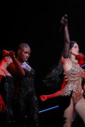 Dua Lipa Ignites the Stage in Sculptural Bronze Bodysuit