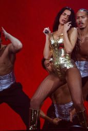 Dua Lipa Ignites the Stage in Sculptural Bronze Bodysuit
