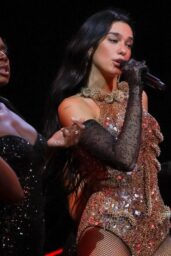 Dua Lipa Ignites the Stage in Sculptural Bronze Bodysuit