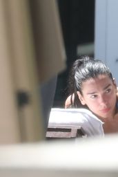 Dua Lipa Unveils Backstage Bliss In Miami Poolside Minimalism