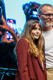 Elizabeth Olsen Commands Comic Con Panel in Burgundy Power Blazer