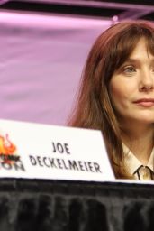Elizabeth Olsen Commands Comic Con Panel in Burgundy Power Blazer