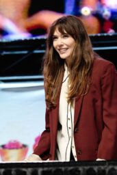 Elizabeth Olsen Commands Comic Con Panel in Burgundy Power Blazer