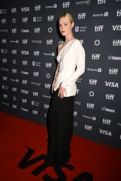 Elle Fanning Sleek Contrast at the Toronto Film Festival