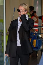 Gwyneth Paltrow Embodies Milan Arrival in Blazer and Blue-Tote Ease