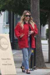 Hilary Duff Embodies LA Casual With A Bold Red Canvas Jacket