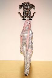 Ice Spice Unveils Gilded Sheer Catsuit at Roberto Cavalli Show